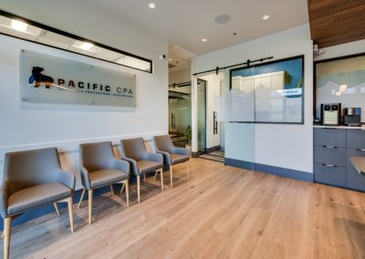 Pacific CPA reception and waiting area with the Pacific CPA sign