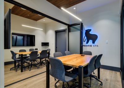 Meeting room with the lit Pacific CPA bear logo