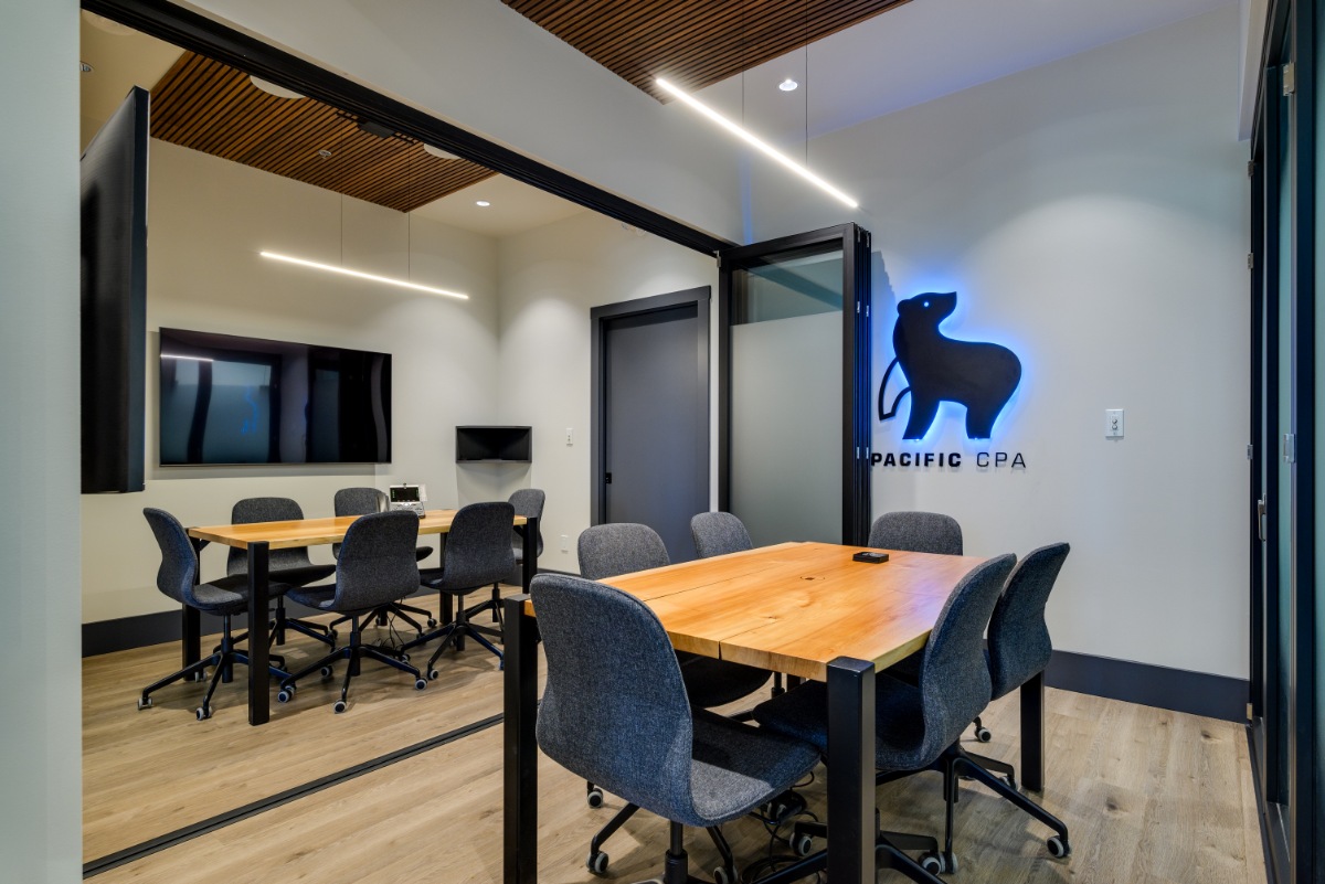 Meeting room with the lit Pacific CPA bear logo