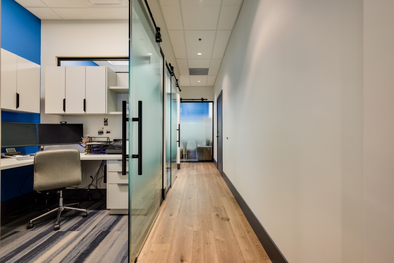Workstation and hallway with glass office doors